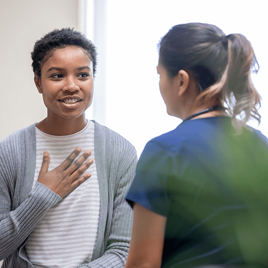 Clinician speaking with Patient